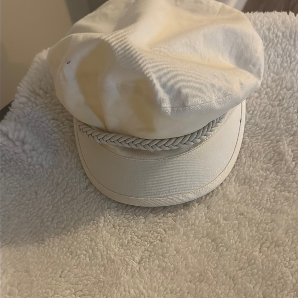 Juicy Couture Cream Cap with Graphic Detail